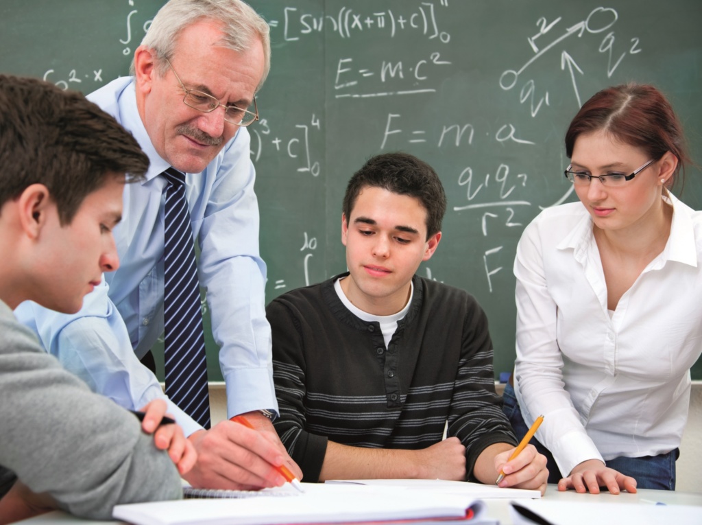 Secondary school teacher delivering a maths lesson.