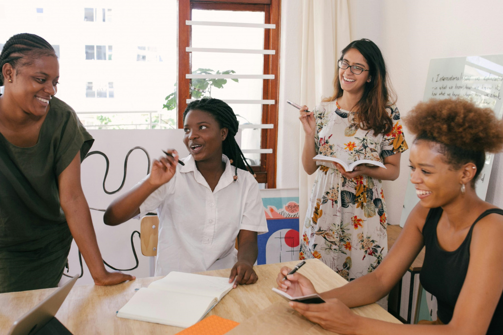 Multiracial group of teachers collaborating in a staff room