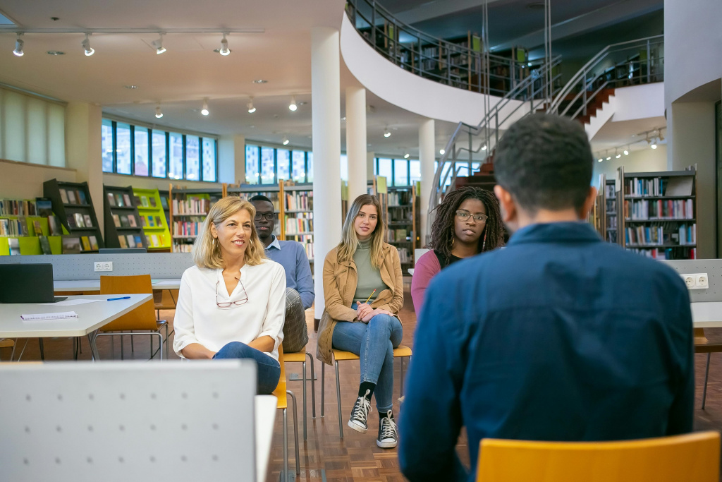 Teacher training exercise in a library.