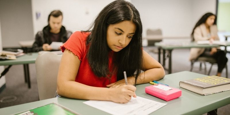 Female student sitting a functional skills qualification