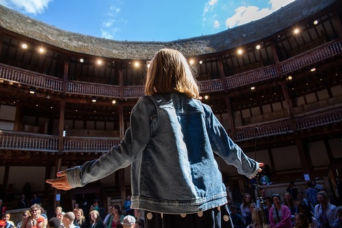 Female Poetry By Heart finalist performing at Shakespeare's Globe in London.